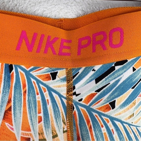 NIKE PRO GIRLS Bright Tropical print Leggings. Size Large. Orange top stitching - Picture 4 of 6